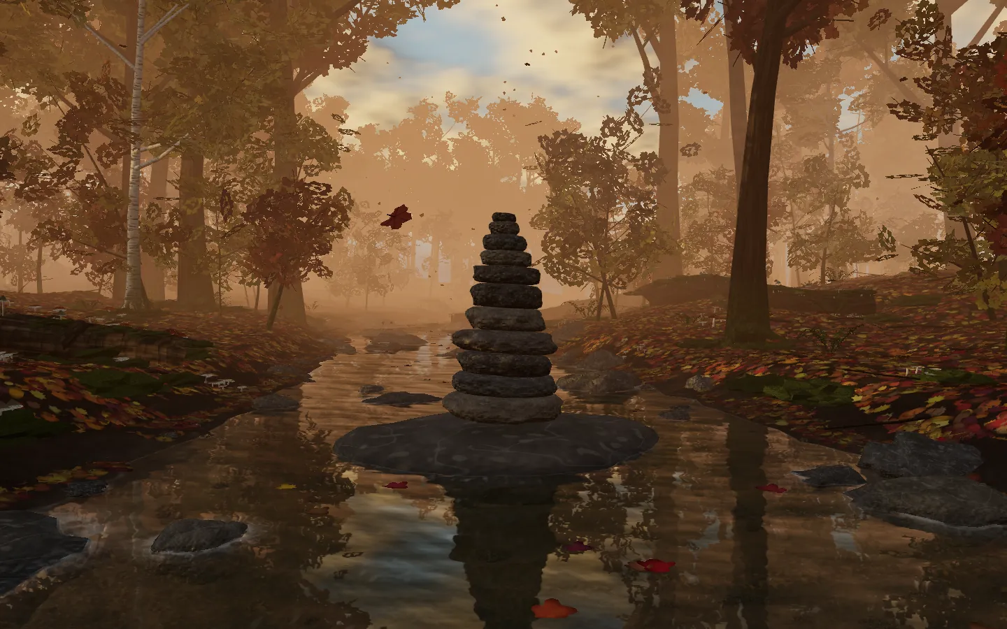 A stacked stone cairn beside a creek in an autumn forest at golden hour