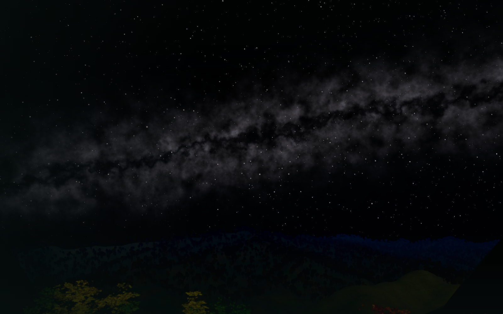 Stars and the Milky Way above the dark autumn forest