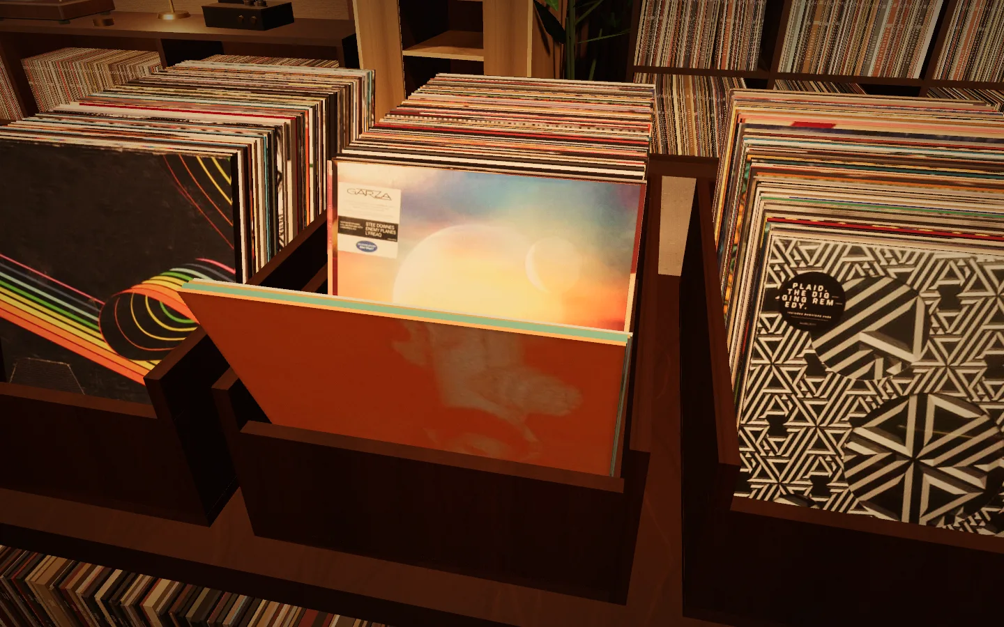 Three walnut dig crates packed with record sleeves, a pink-and-orange cover lifted at the front of the middle one, a rainbow sleeve and a black-and-white geometric cover in the crates either side, shelves of records behind