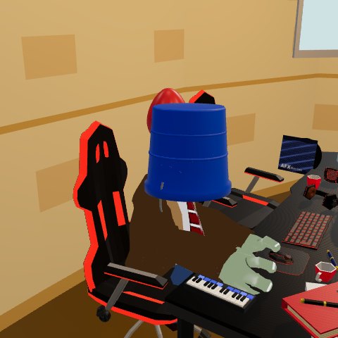 Naveen's Buckethead character, the office zombie with a blue bucket over his head, at the desk with the MIDI keyboard
